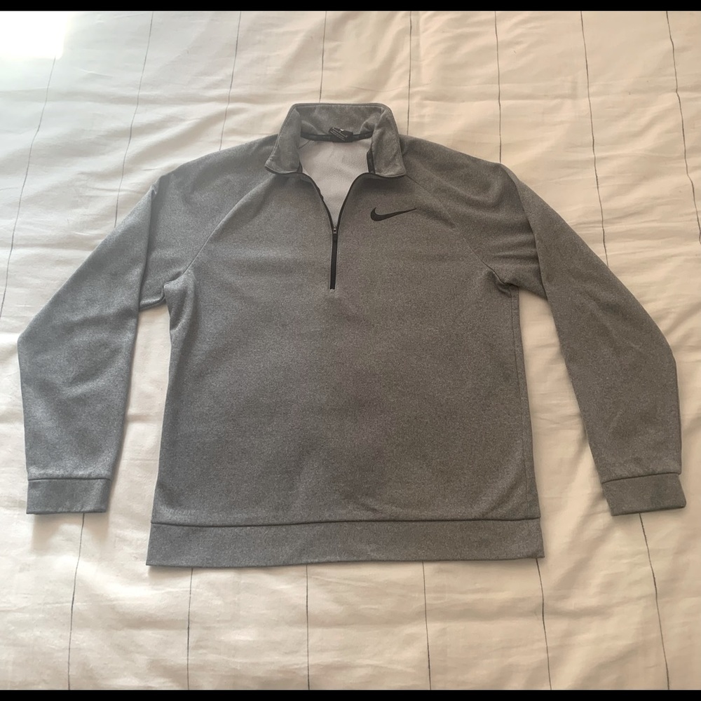 Medium gray Nike quarter zip.